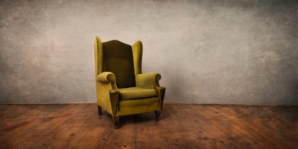 Old retro chair in empty rustic living room.