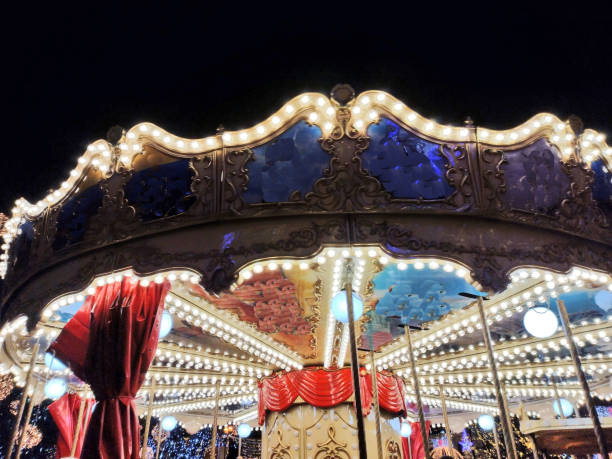 istock carousel with lights and animals for children 1357441364