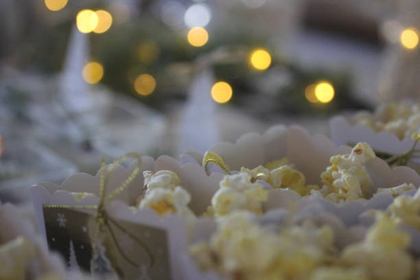 istock White Christmas party decorations - a table set for a Xmas celebration - close-up 1357441969