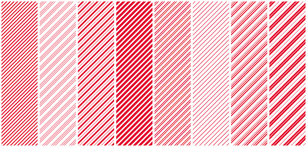 Set of seamless patterns. Red diagonal lines on a white background. Vector striped backgrounds.