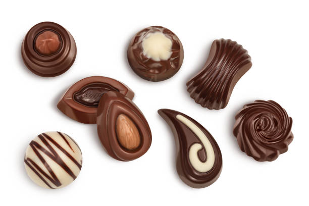 istock Chocolate candy isolated on white background with clipping path and full depth of field. Top view. Flat lay. 1357447413