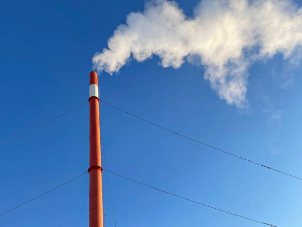 istock Pollution of the environment by smoke from pipes. 1357449045