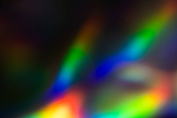istock colorful rainbow crystal light leaks on black background 1357451294