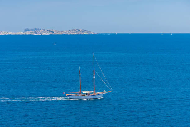 sailboat sailing on the mediterranean sea off Marseille on a bright summer day in France