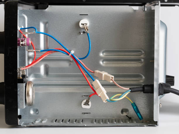 istock Wires and cables inside electrical appliances. Used to connect and transmit power and digital signals 1357453685