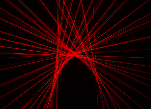 istock Abstract red lines drawn by light on a black background 1357454787