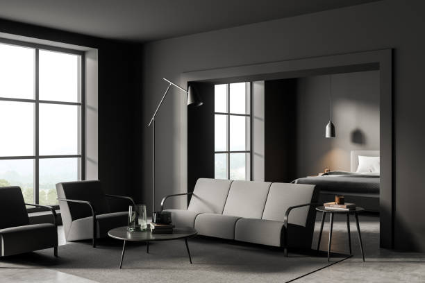 istock Living room interior with two armchairs, sofa, bed, panoramic window 1357455743