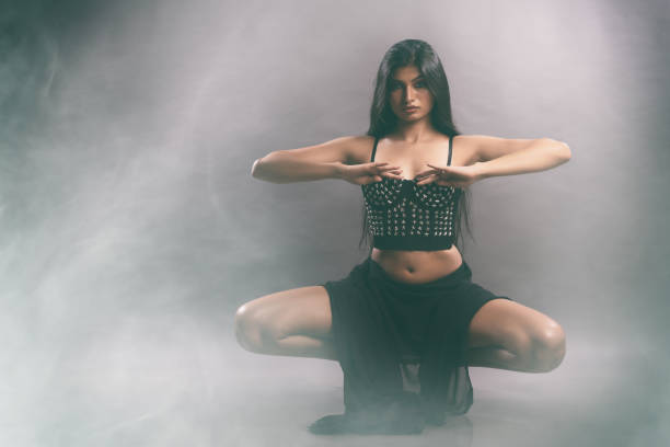 istock Active acrobatic dance poses by Indian young female model 1357457098