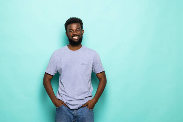 istock African american man laughing against turquoise background 1357458125