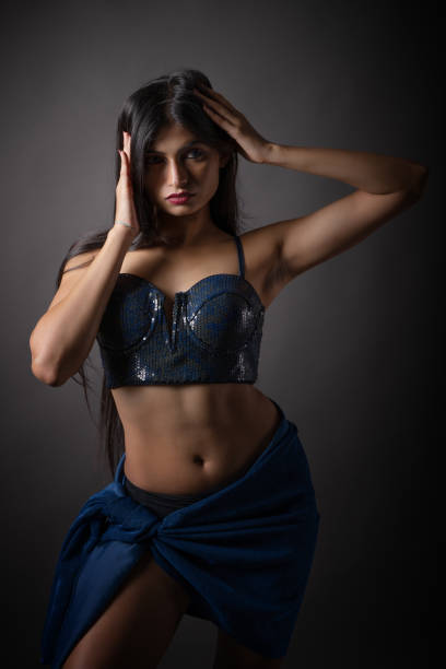 istock Low key portrait of young female model 1357458636