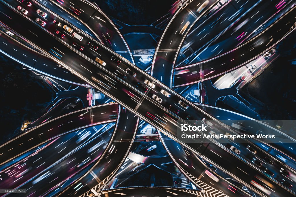 Drone Point View of Overpass and City Traffic at Night Aerial View of Overpass and City Traffic at Night / Shanghai, China Road Stock Photo