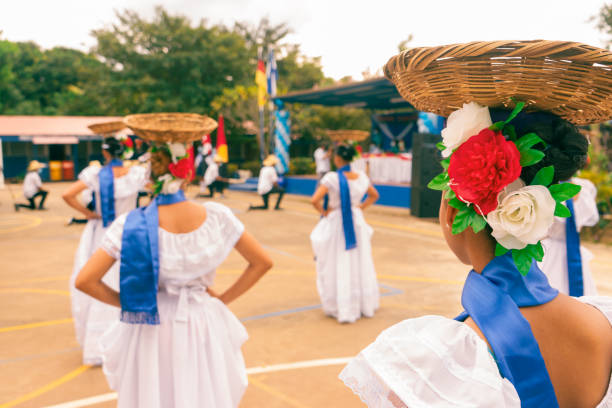 A group of women backguards wearing the traditional costume of Central America A group of women backguards wearing the traditional costume of Central America, Nicaragua, Costa Rica, Honduras, El Salvador, Guatemala, Panama and other Latin American and South America countries. nicaragua stock pictures, royalty-free photos & images