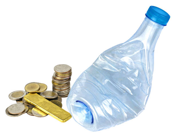 istock Plastic bottle recycle and coin, gold isolated on white background. 1357460285
