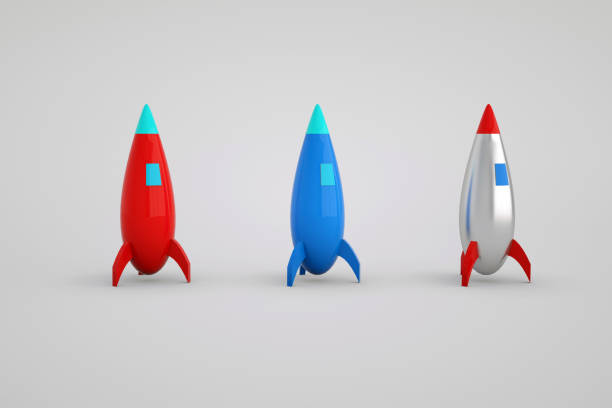 istock 3D render three colored rockets on a white background. Isolated cartoon space shuttle illustration 1357462675