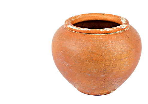 Old clay pot isolated on white background.
