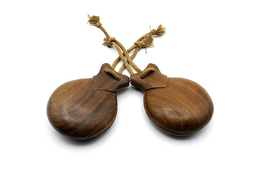 Spanish castanuelas, typical musical instrument of Spanish folklore, typical of the Aragonese jota on white background.