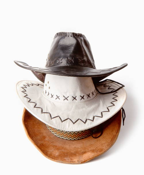 istock three different and multicolored classic wide brim cowboy hats isolated on white background 1357478752