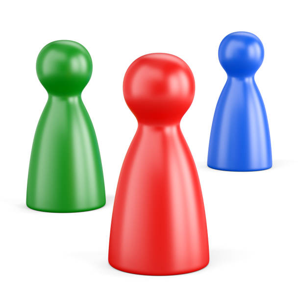 istock Red, green and blue board game pawns isolated on white background 1357481346