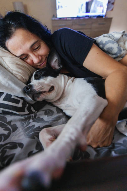 istock Woman with dog 1357481599