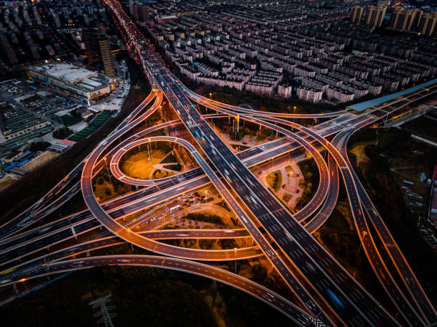 istock Aerial view of a road intersection at night 1357482208