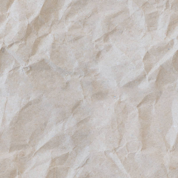 istock Craft aged old paper grunge recycled seamless pattern 1357493327