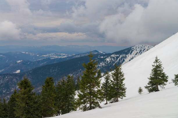 istock Winter mountain landscape. Deep snow in the mountains 1357493505