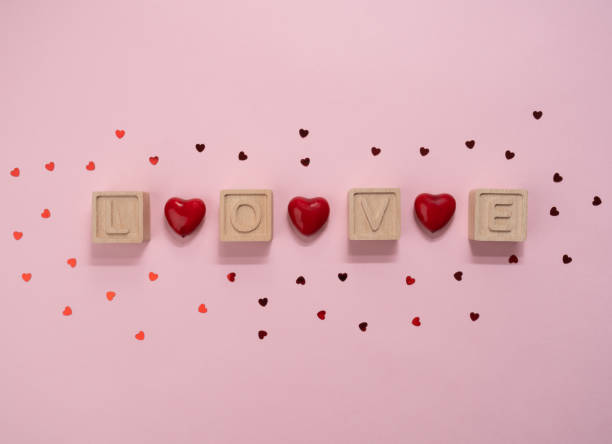 istock Love inscription and hearts 1357496821
