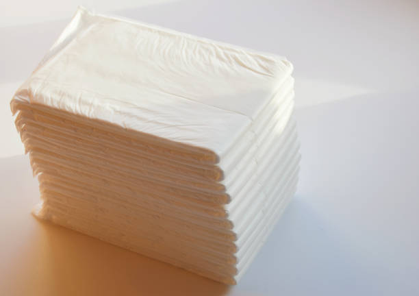 istock a stack of baby white diapers. hygiene products on a white background. 1357500693