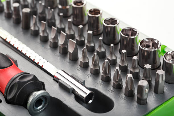 istock Tool box with attachments and bits of different shapes and sizes close-up. 1357500941