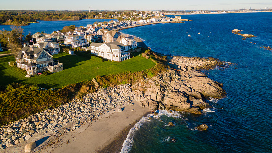 Several large homes along rocky Massachusetts coastline