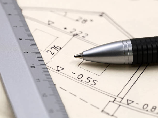 istock architecture plan of a house with pen and ruler, close up 1357507056