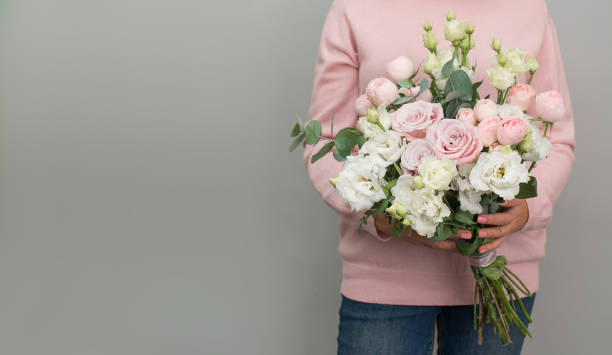 istock Beautiful bouquet in woman’s hands. Valentines, flowers. 1357509511