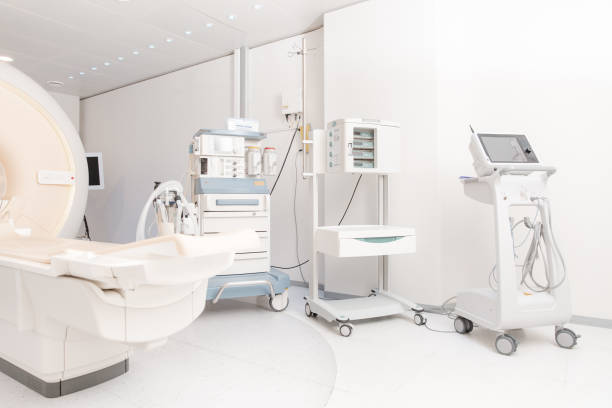 istock Technologically advanced equipment in CT or MRI Scan room. Modern hospital laboratory. Interior of radiography department. Magnetic resonance diagnostics machine 1357512601