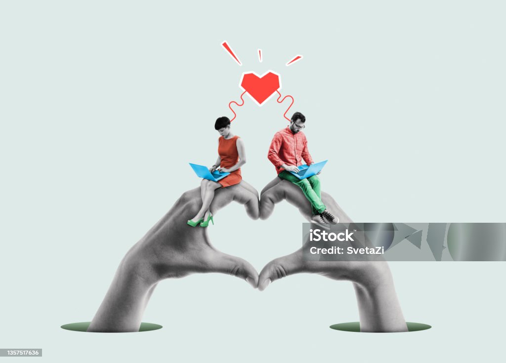 Concept for online dating or love correspondence. Concept for online dating or love correspondence. A man and a woman meet and communicate on the Internet. Love - Emotion Stock Photo