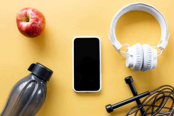 istock Flat lay composition with sports equipment on yellow background. 1357520382