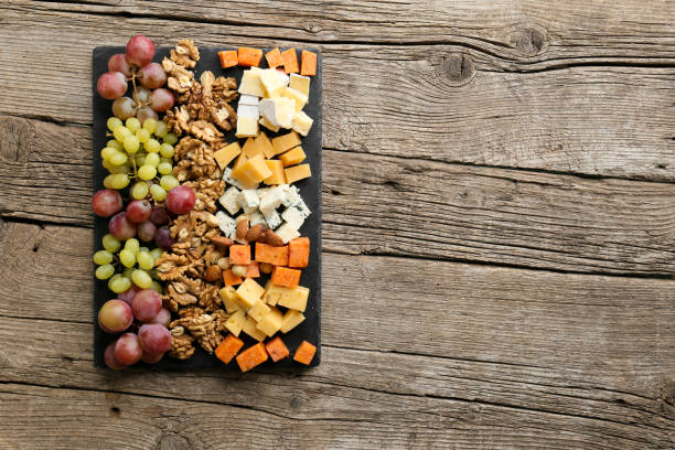 istock Cheese plate with variety of appetizers on table 1357520959