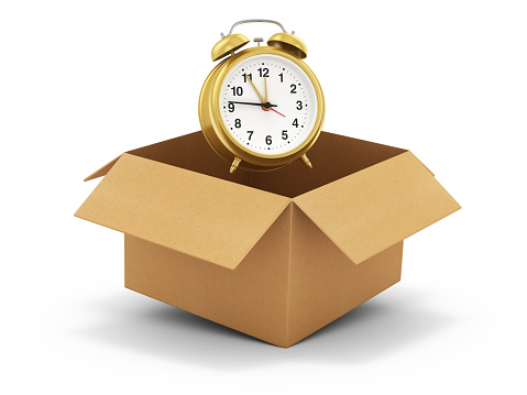 3d render Alarm Clock in Cardboard box (isolated on white background and clipping path)