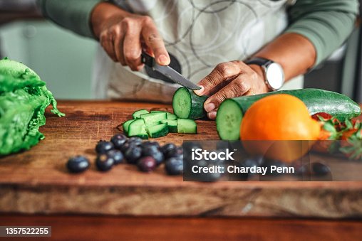 istock Shot of an unrecognisable senior man cooking a healthy meal at home 1357522255
