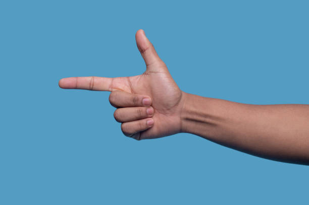 istock Right hand showing a finger gun gesture 1357525796