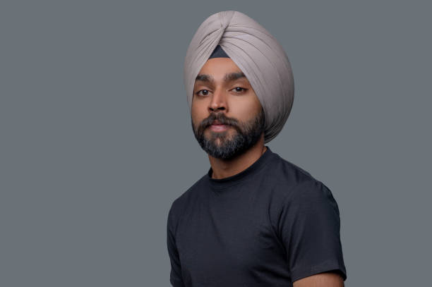 istock Serene bearded mustached guy wearing the head wrap 1357526028