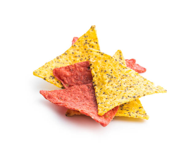 istock Salted tortilla chips triangle with red beet flavor and with chia seeds. 1357528567