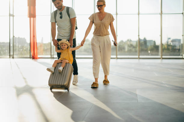 istock Young Family Having Fun Traveling Together 1357530071