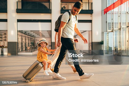 istock Young Family Having Fun Traveling Together 1357530144