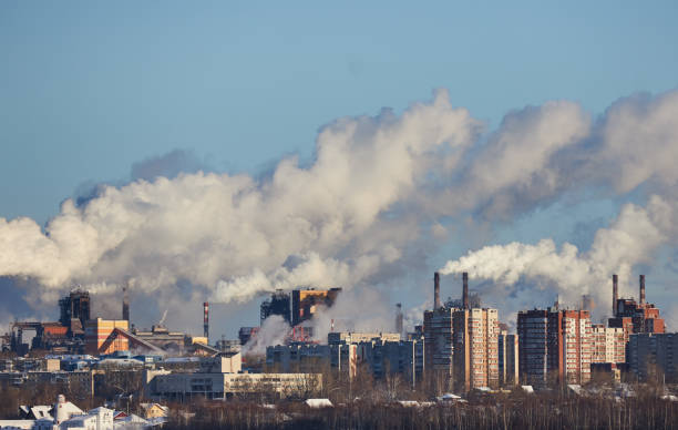 istock Environmental disaster. Poor environment in city. Harmful emissions into environment. Smoke and smog. Pollution of atmosphere by factory. Exhaust gases 1357532241