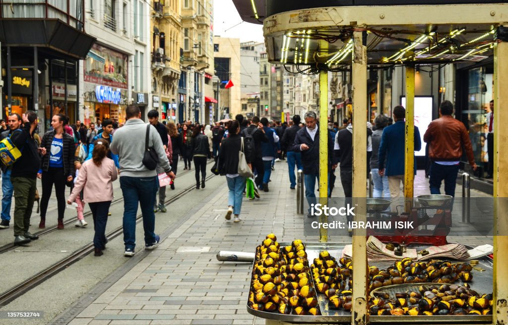 istiklal street and chestnut shops Chestnut vendors on Istiklal Street in Istanbul are one of the indispensable parts of winter. Istanbul Stock Photo