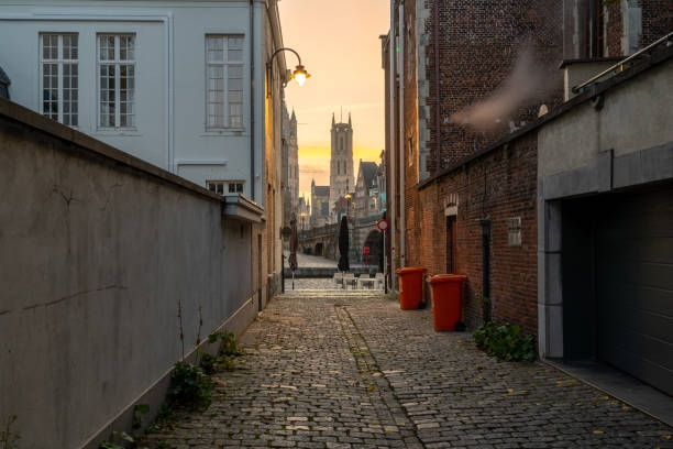 Graslei with the towers of Ghent At the Graslei with the towers of Ghent with beautiful refection st nicholas church prague stock pictures, royalty-free photos & images