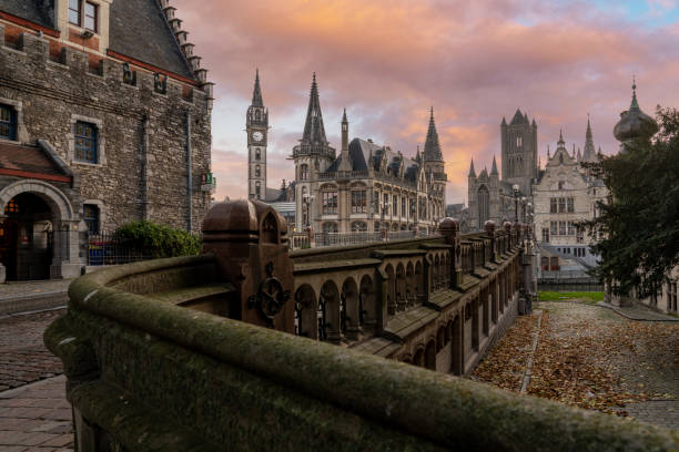 Graslei with the towers of Ghent At the Graslei with the towers of Ghent with beautiful refection st nicholas church prague stock pictures, royalty-free photos & images