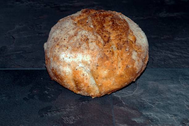 istock freshly baked homemade bread without yeast bread. 1357534154