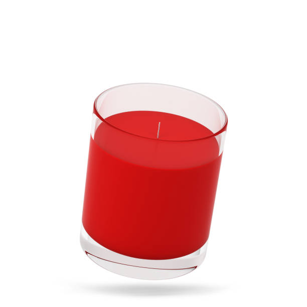 istock Wax candle in a glass 1357535112