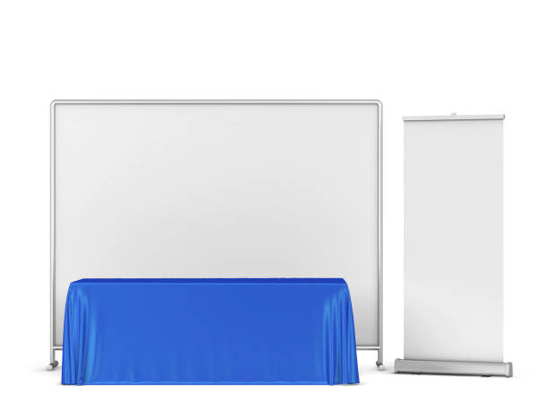 istock Blank tradeshow tablecloth with backdrop and rollup banners mockup 1357535292